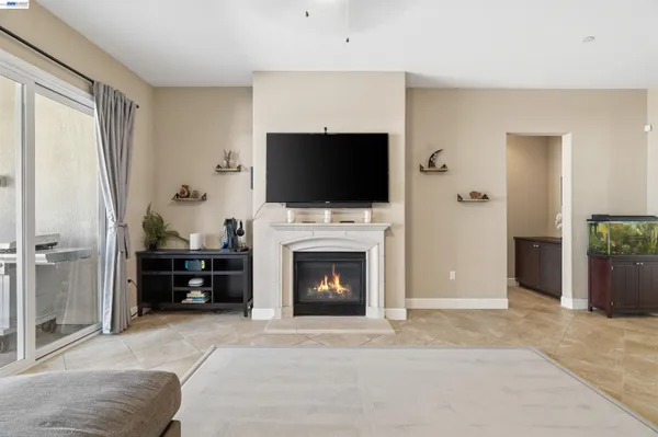 a view of a dining room with furniture and window