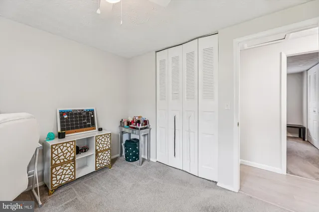 a view of room with fan