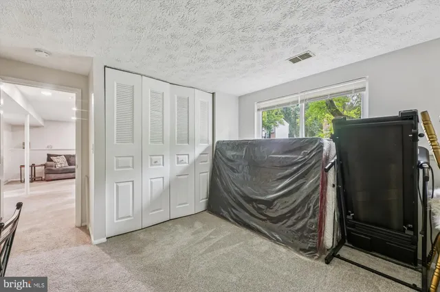 a view of a workspace with furniture