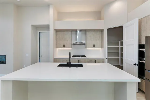 a room with a bed and furniture