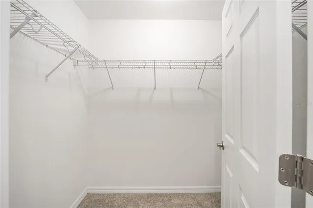 a view of small space with racks on the wall