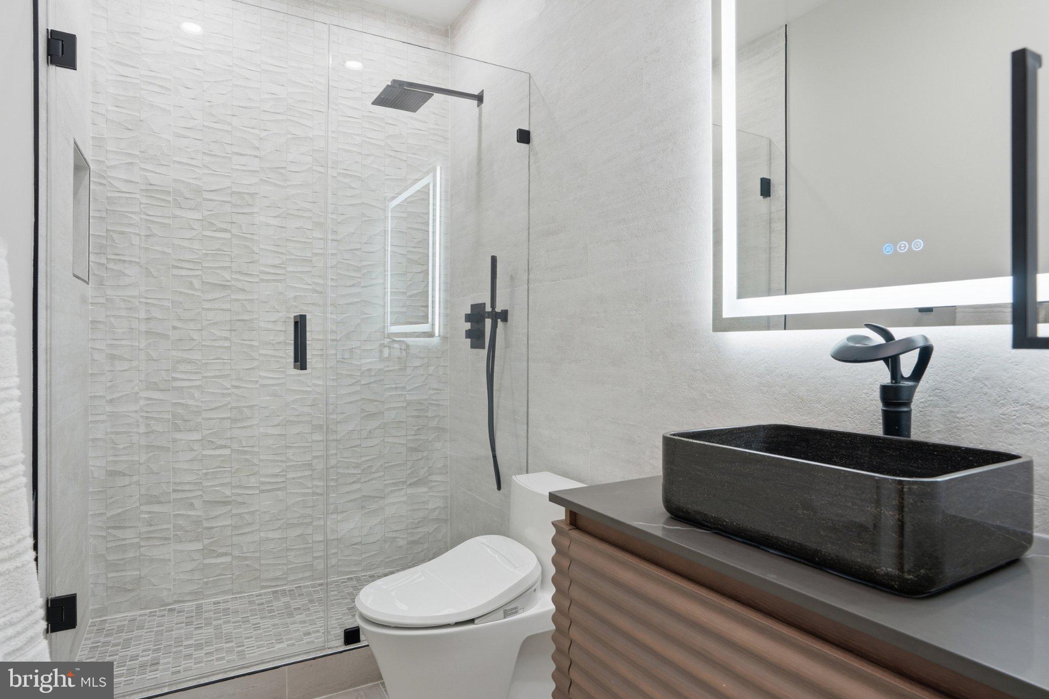 891 Chinquapin Road McLean, VA 22102 - Photo 39 of 78 Sleek modern bathroom oasis.