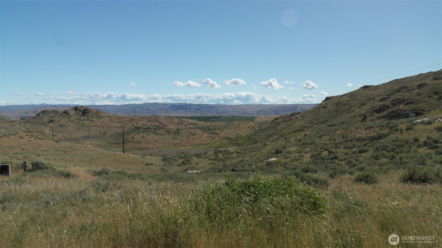 446 Plata Road Brewster, WA 98812 - Photo 3 of 32 a view of a mountain in the distance