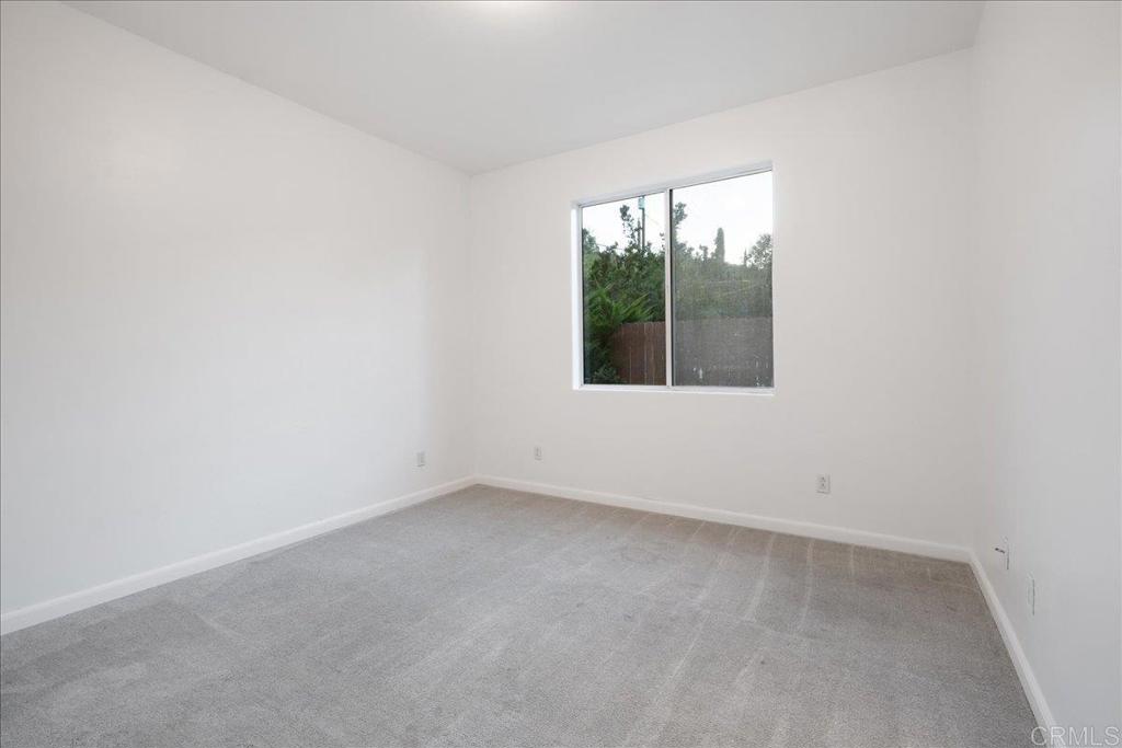 9144 Old Castle Road Valley Center, CA 92082 - Photo 26 of 48 an empty room with a window