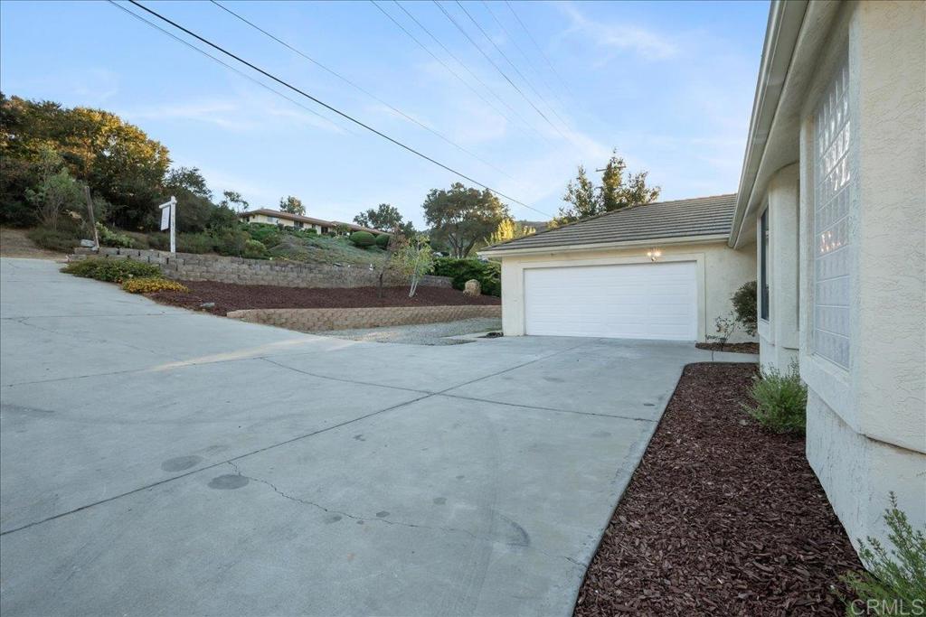 9144 Old Castle Road Valley Center, CA 92082 - Photo 40 of 48 a view of a back yard of the house