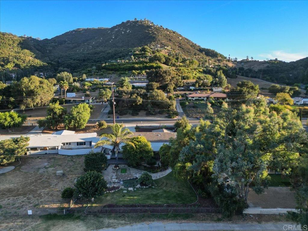 9144 Old Castle Road Valley Center, CA 92082 - Photo 42 of 48 a view of a house with a garden