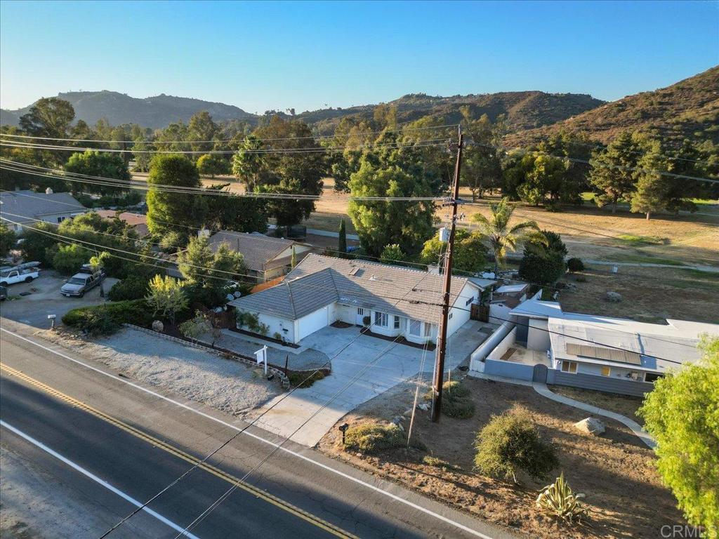 9144 Old Castle Road Valley Center, CA 92082 - Photo 47 of 48 a view of a lake with a mountain in the background