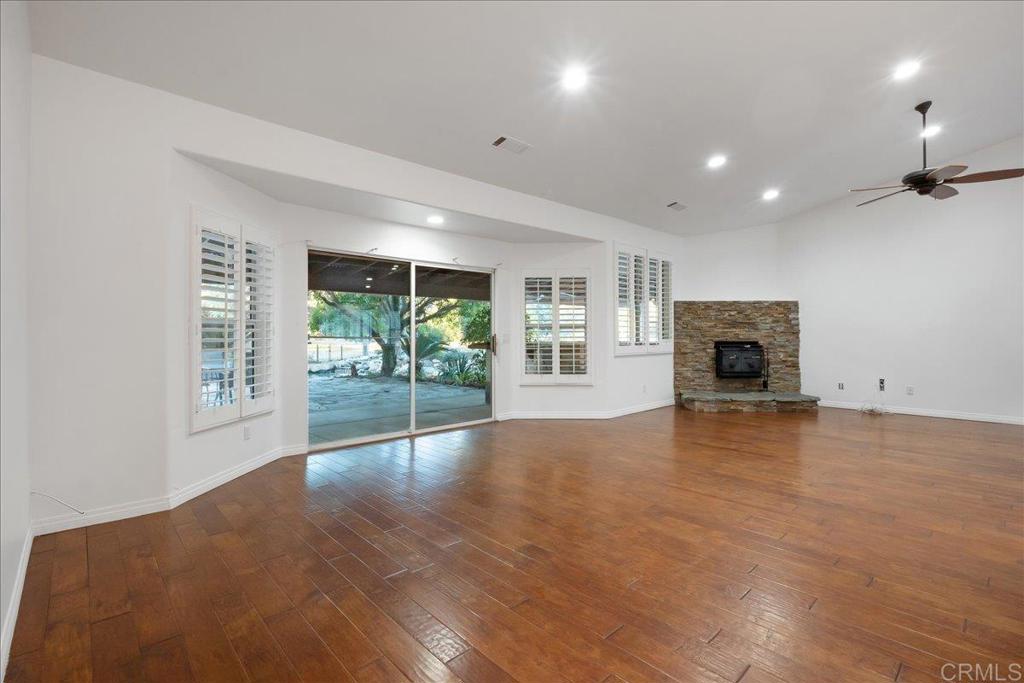 9144 Old Castle Road Valley Center, CA 92082 - Photo 6 of 48 a view of a livingroom with furniture and a fireplace
