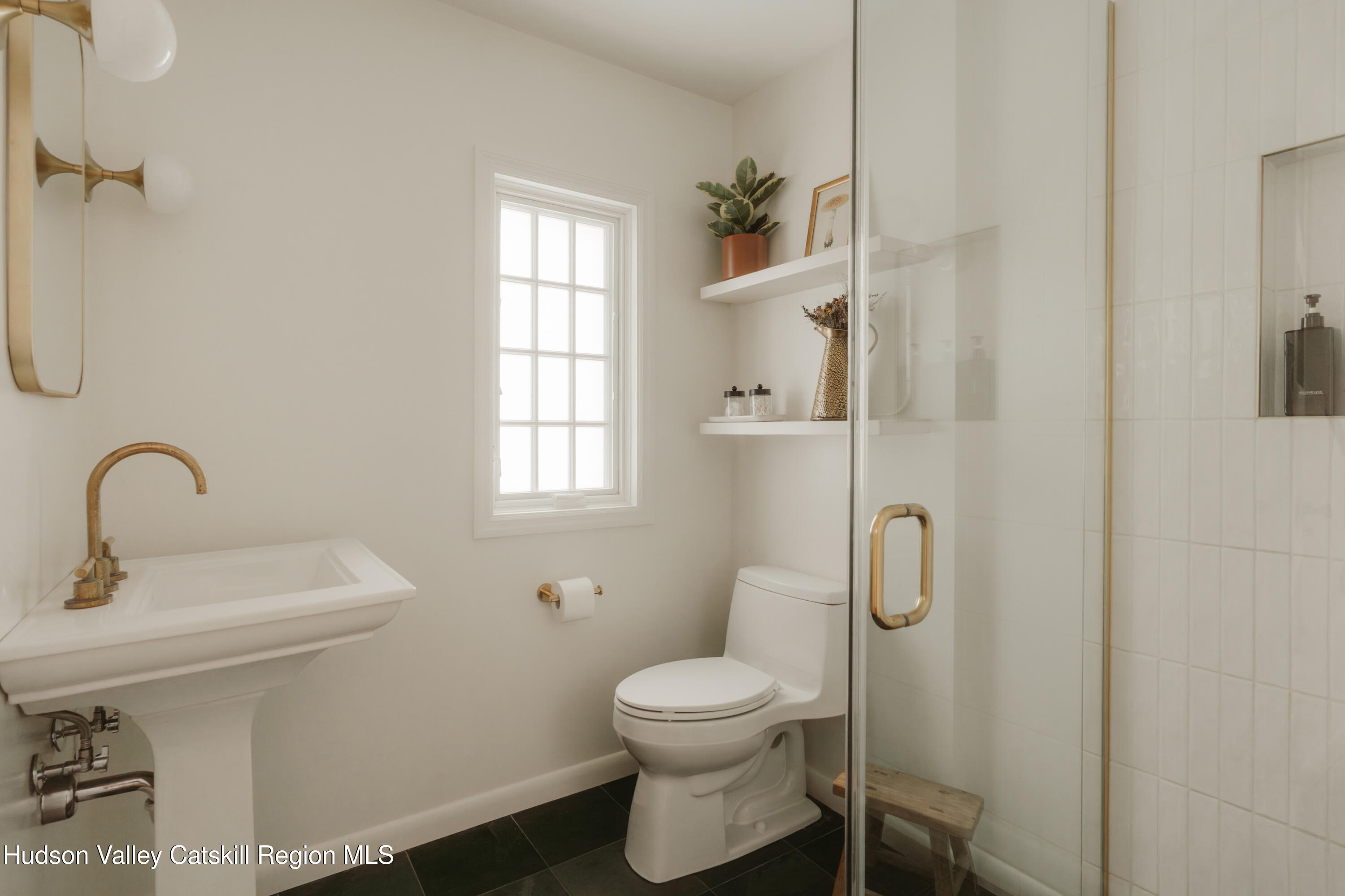 114 Dutchtown Road Saugerties, NY 12477 - Photo 19 of 44 a bathroom with a toilet sink and mirror