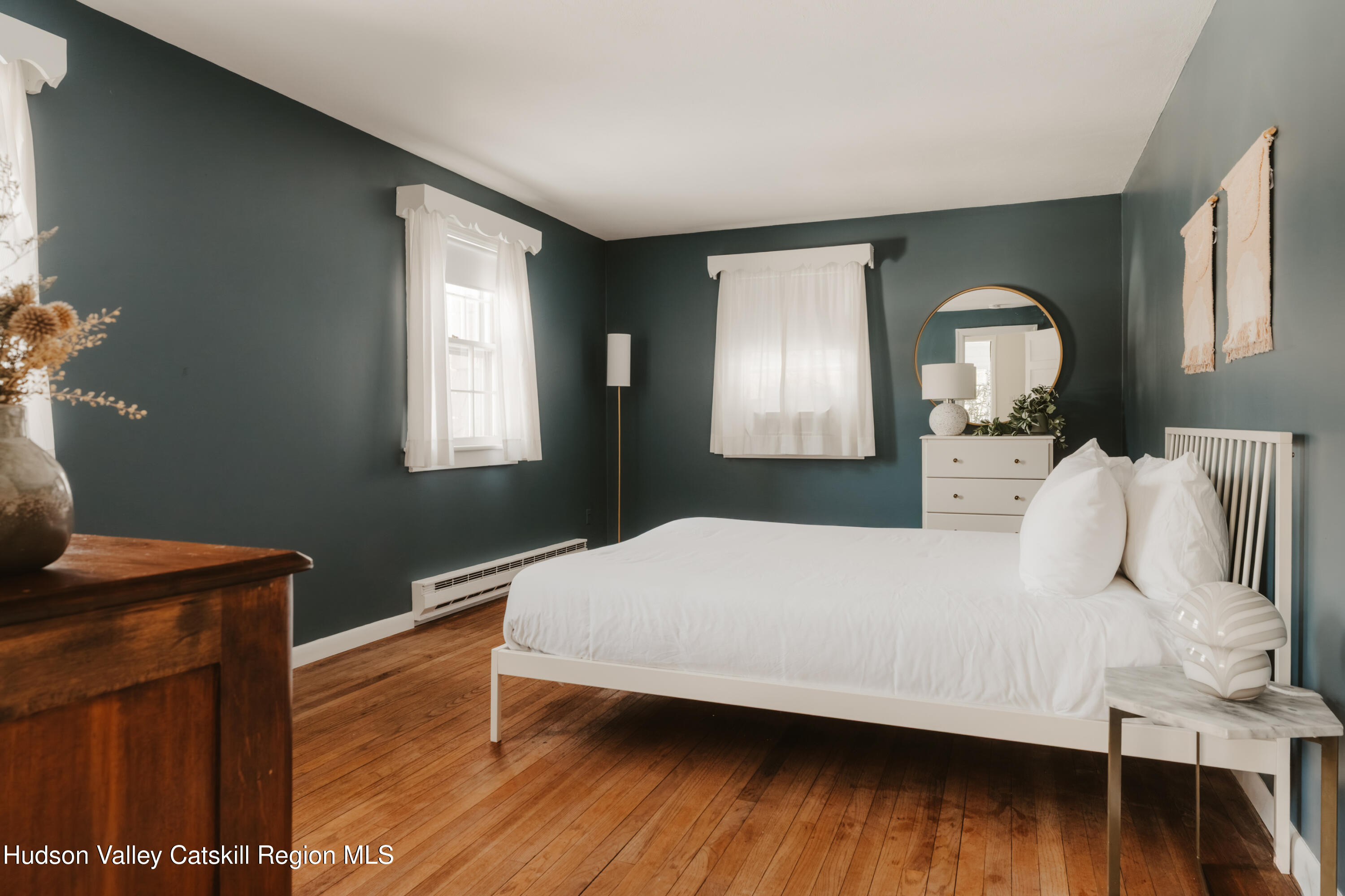 114 Dutchtown Road Saugerties, NY 12477 - Photo 21 of 44 a bedroom with a bed and wooden floor