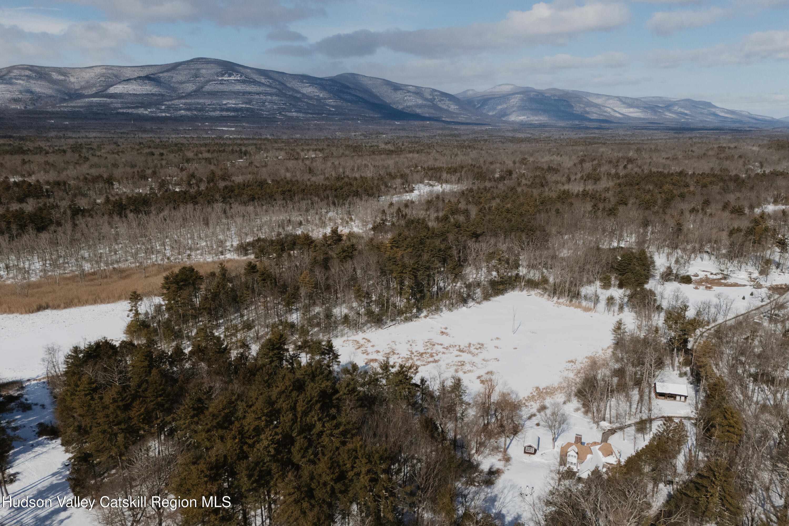 114 Dutchtown Road Saugerties, NY 12477 - Photo 41 of 44 a view of a lake with mountains in front of it