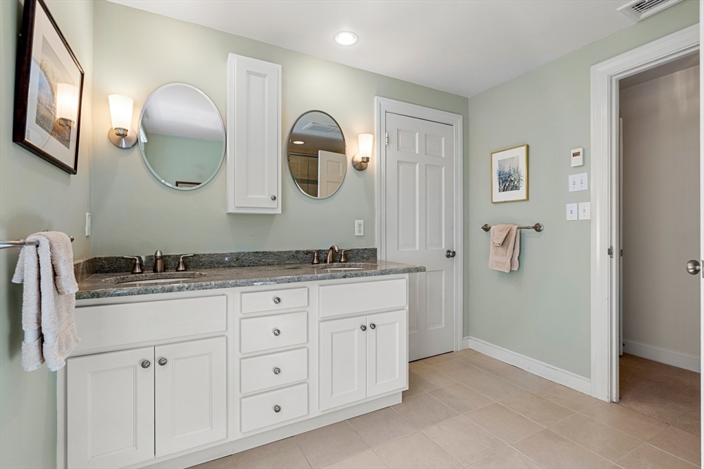 5 Crestwood Road Marblehead, MA 01945 - Photo 15 of 28 a bathroom with a granite countertop double vanity sink and a mirror