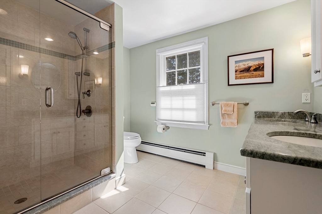 5 Crestwood Road Marblehead, MA 01945 - Photo 16 of 28 a bathroom with a granite countertop sink mirror and shower