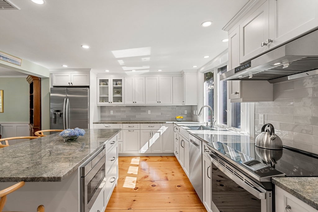 5 Crestwood Road Marblehead, MA 01945 - Photo 6 of 28 a kitchen with stainless steel appliances granite countertop a sink stove and refrigerator