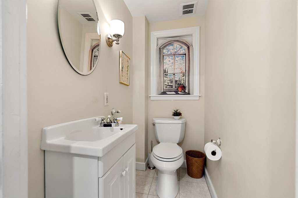 5 Crestwood Road Marblehead, MA 01945 - Photo 8 of 28 a bathroom with a toilet sink and mirror
