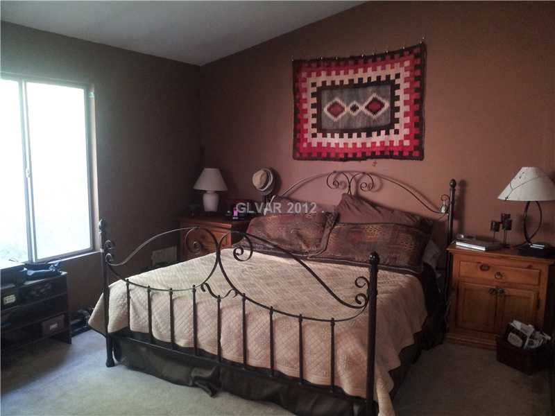 1434 Heather Ridge Road North Las Vegas, NV 89031 - Photo 18 of 24 Master Bedroom.