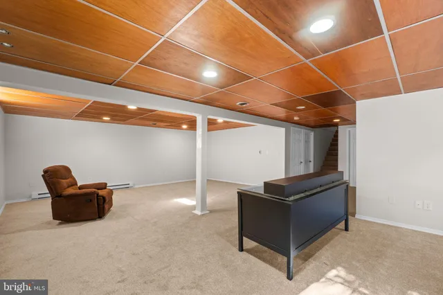 a view of workspace with furniture and air conditioner