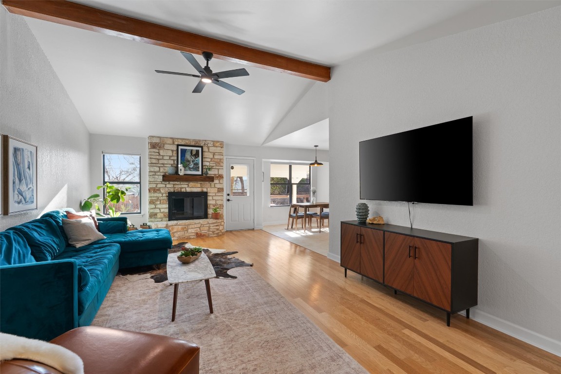 1204 Dunman Drive Georgetown, TX 78628 - Photo 2 of 40 a living room with furniture and a flat screen tv
