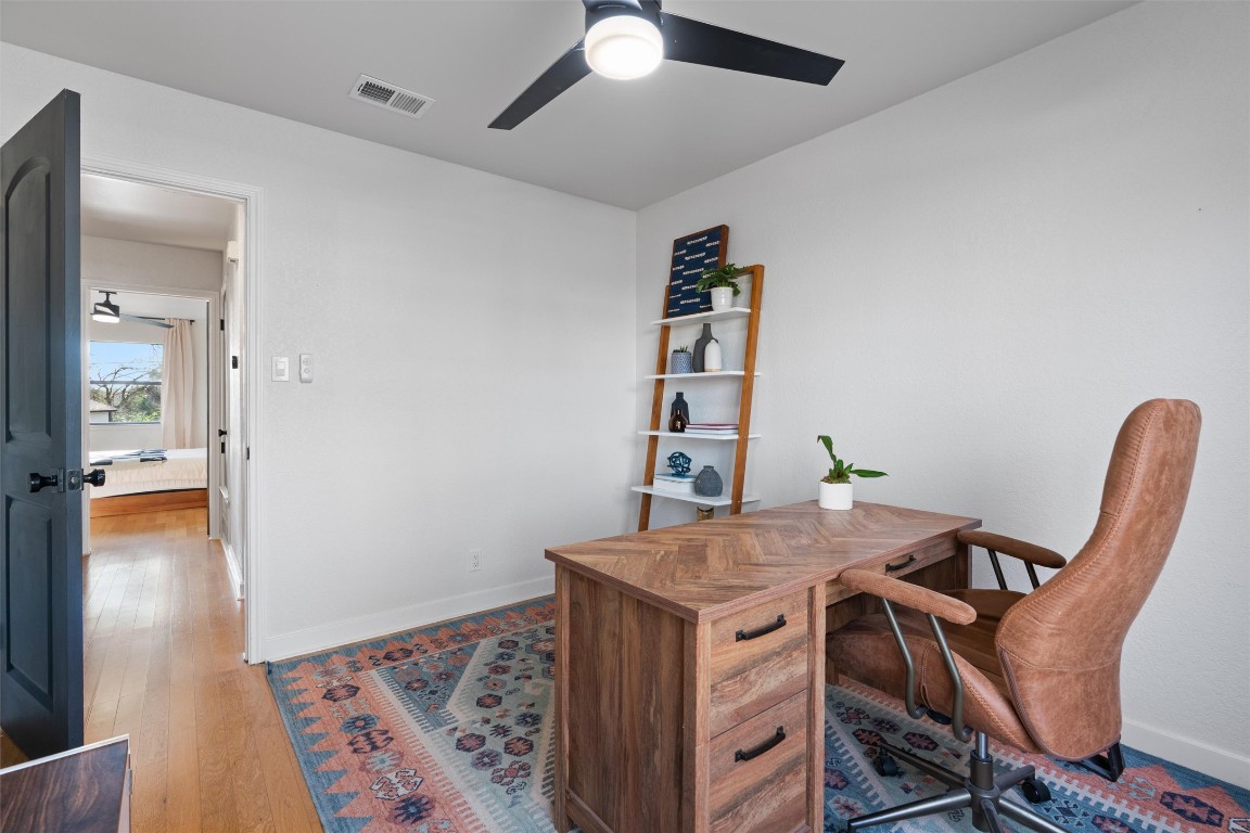 1204 Dunman Drive Georgetown, TX 78628 - Photo 25 of 40 a view of a workspace with furniture