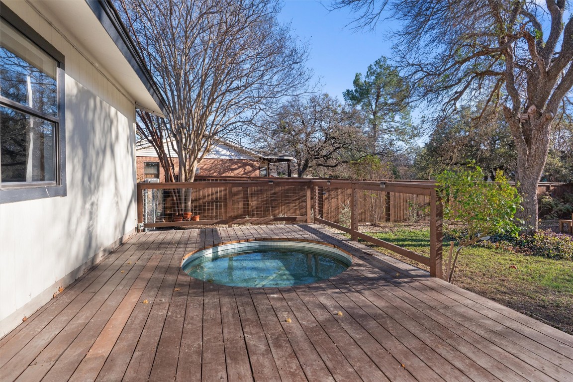 1204 Dunman Drive Georgetown, TX 78628 - Photo 28 of 40 a view of outdoor space with wooden floor and large trees