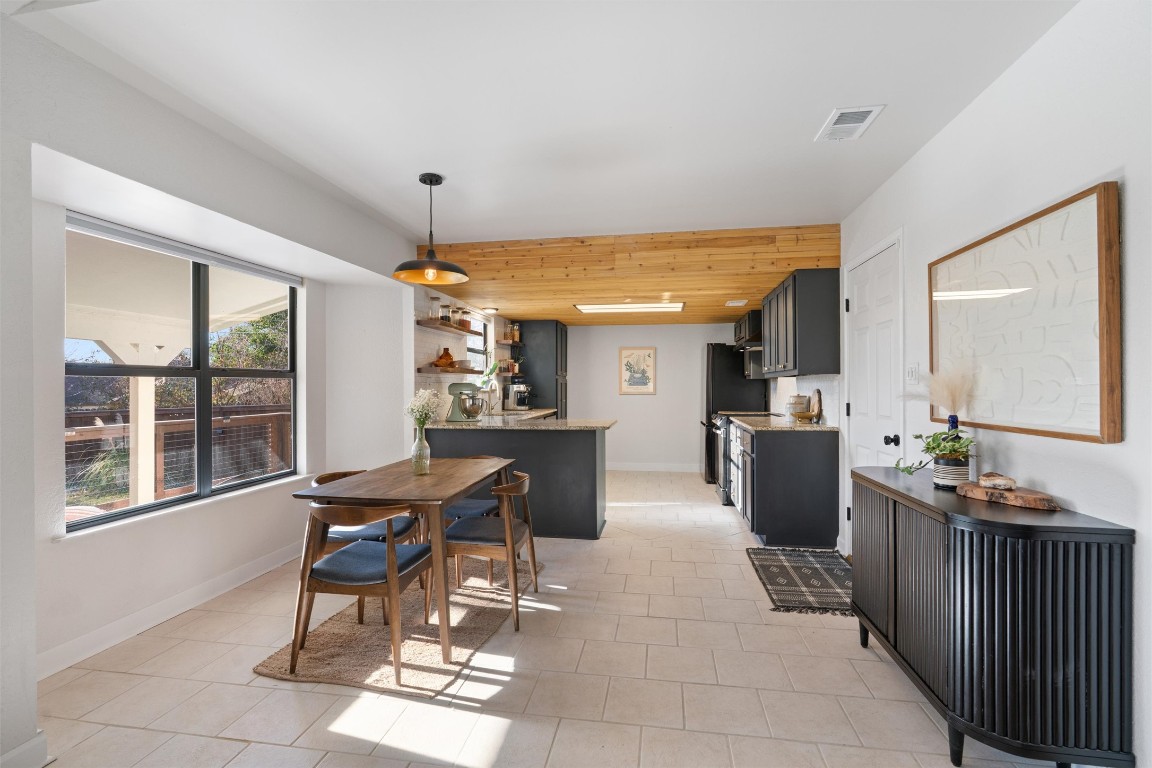 1204 Dunman Drive Georgetown, TX 78628 - Photo 3 of 40 a view of a dining room with furniture window and outside view