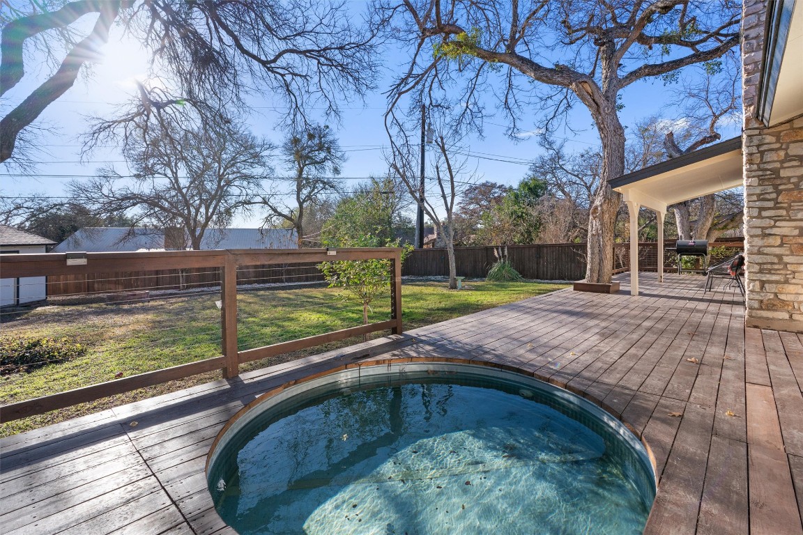 1204 Dunman Drive Georgetown, TX 78628 - Photo 5 of 40 a view of a backyard with wooden fence