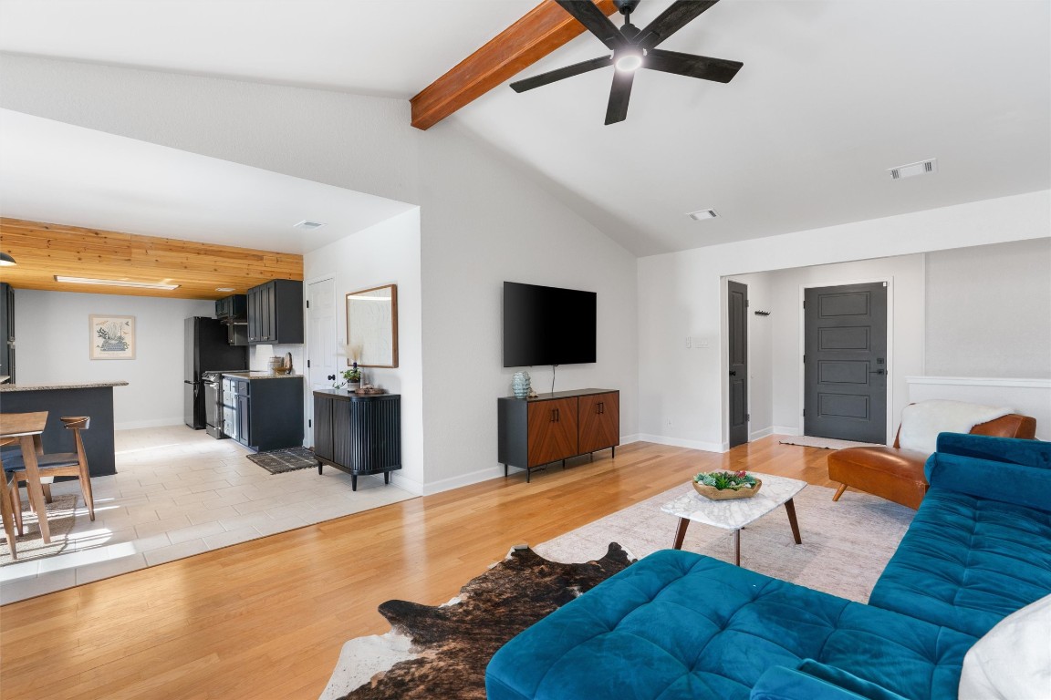 1204 Dunman Drive Georgetown, TX 78628 - Photo 7 of 40 a living room with furniture and a flat screen tv