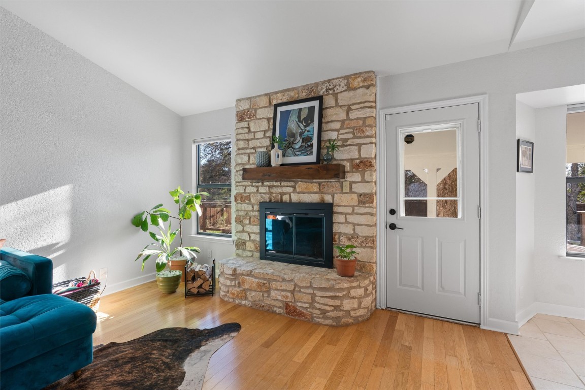1204 Dunman Drive Georgetown, TX 78628 - Photo 8 of 40 a living room with furniture and a fireplace
