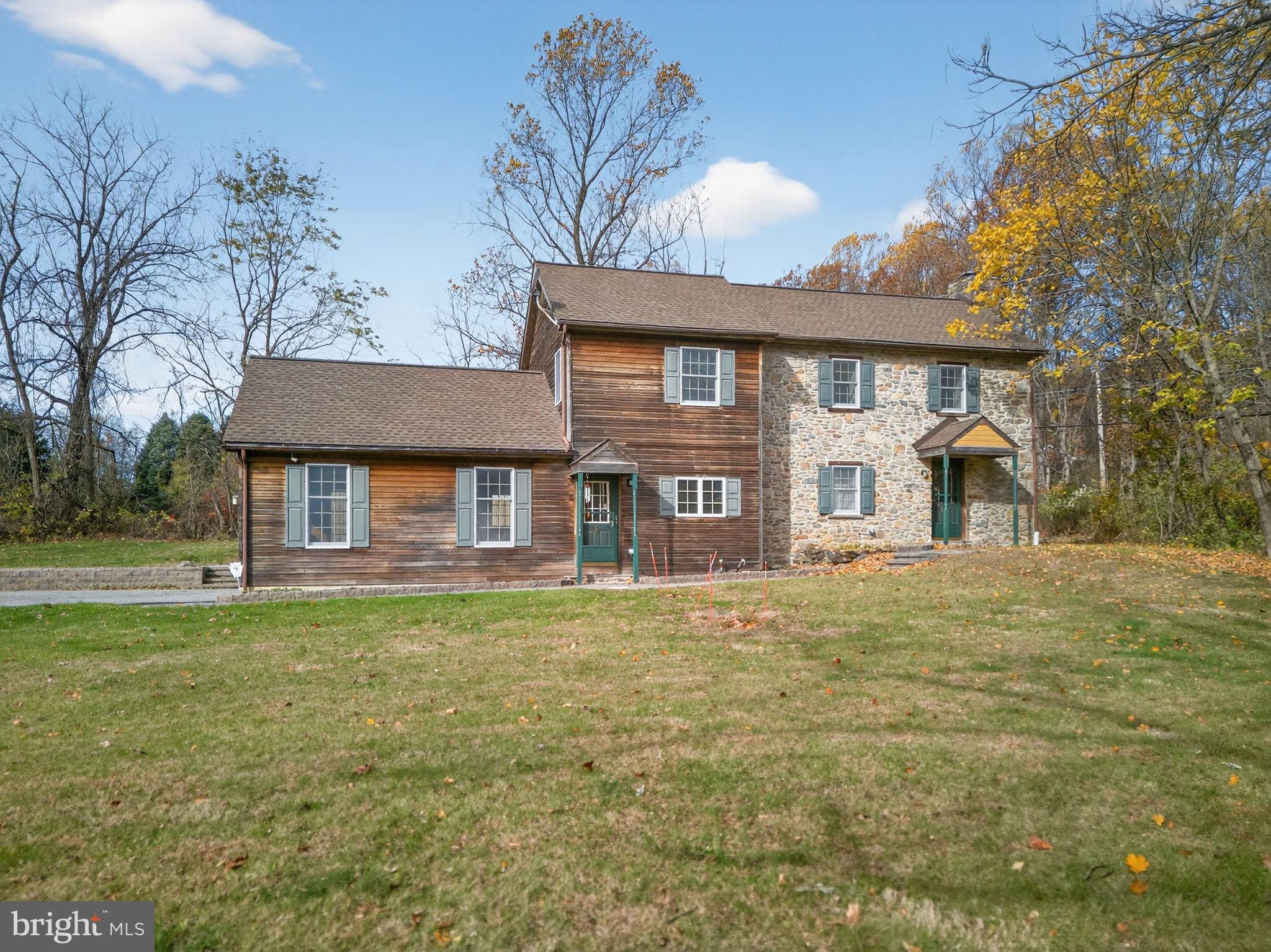 Charming blend of stone and wood exterior.