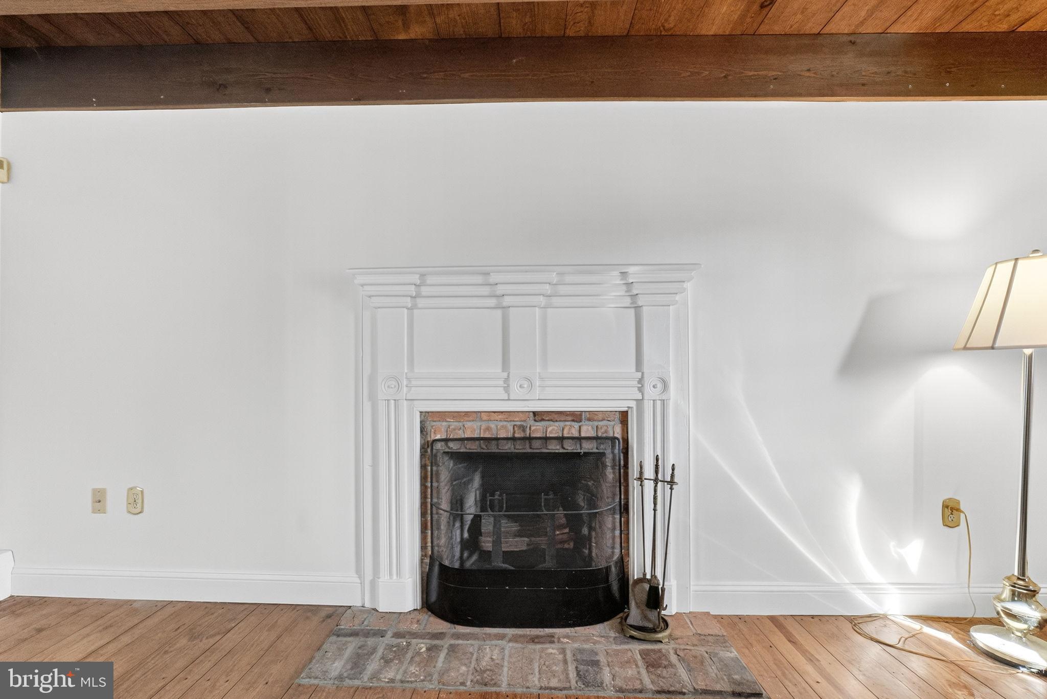 275 Sally Ann Furnace Road Mertztown, PA 19539 - Photo 11 of 33 Charming fireplace in a cozy setting.
