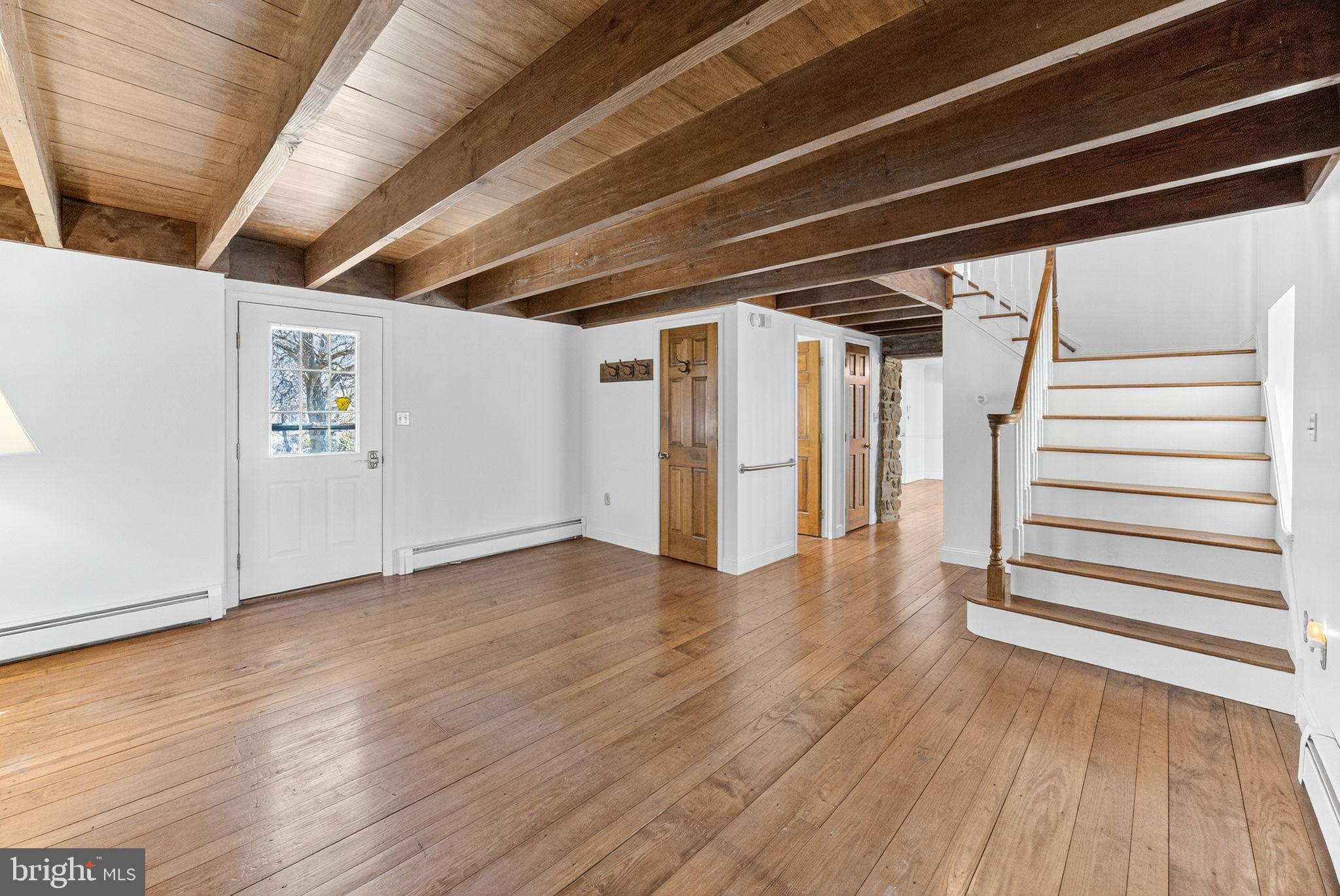 275 Sally Ann Furnace Road Mertztown, PA 19539 - Photo 14 of 33 Spacious room with rustic wooden beams.
