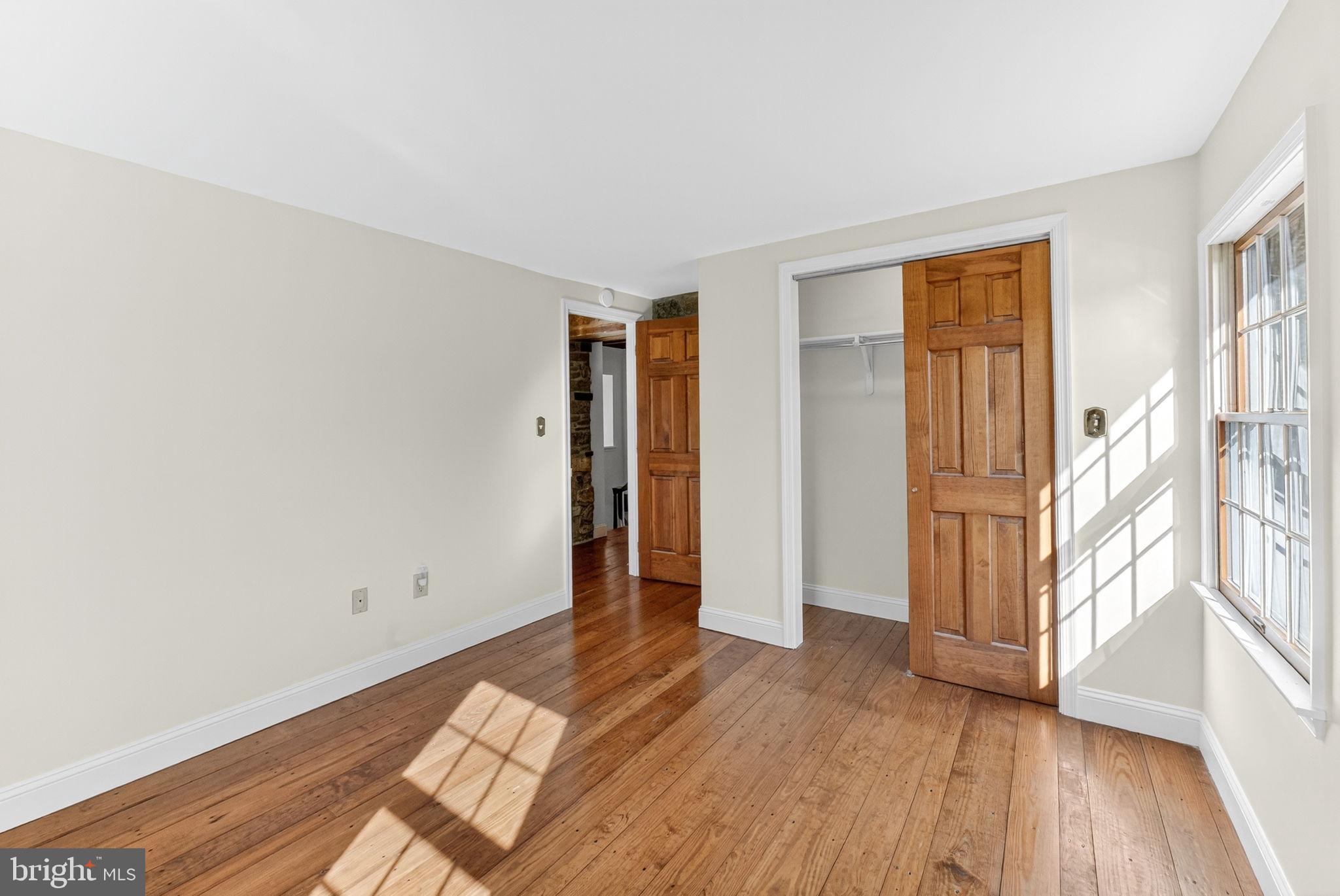 275 Sally Ann Furnace Road Mertztown, PA 19539 - Photo 17 of 33 Bright and airy room with warm wood floors.