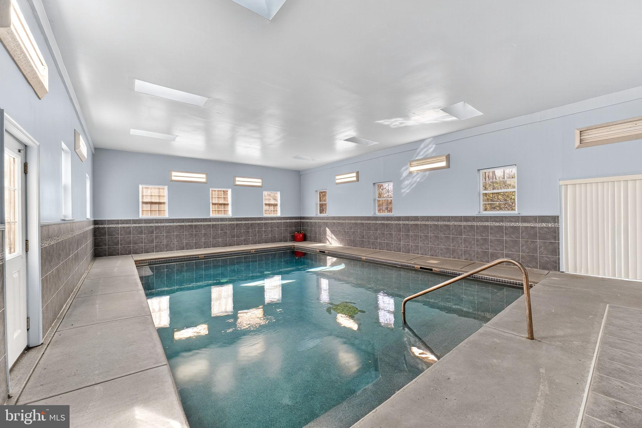 275 Sally Ann Furnace Road Mertztown, PA 19539 - Photo 26 of 33 Indoor oasis with serene swimming pool.