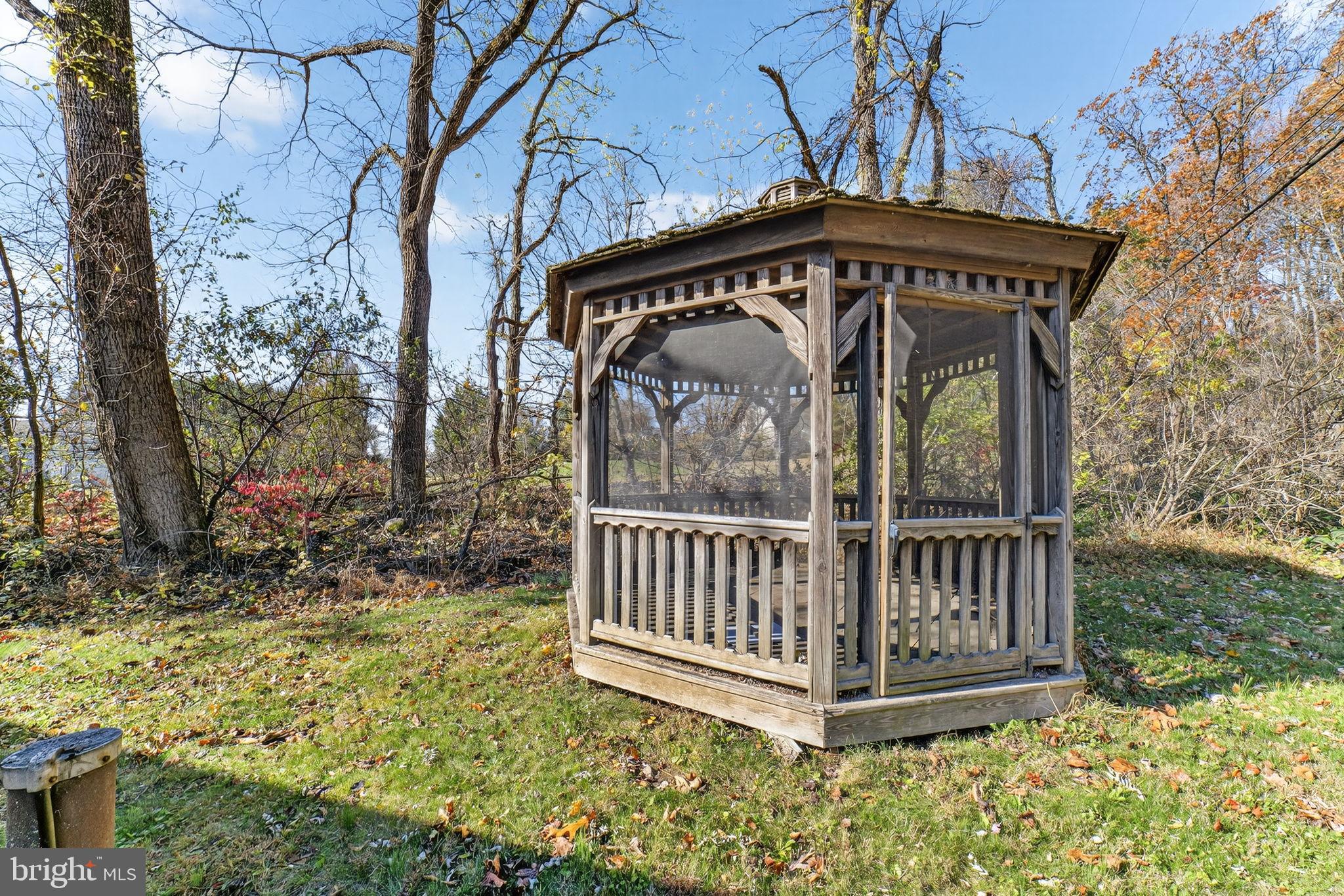 275 Sally Ann Furnace Road Mertztown, PA 19539 - Photo 29 of 33 Charming gazebo nestled in a serene landscape.
