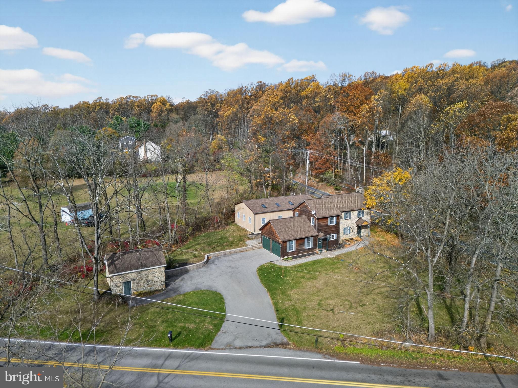 275 Sally Ann Furnace Road Mertztown, PA 19539 - Photo 6 of 33 Charming home nestled among autumn trees.