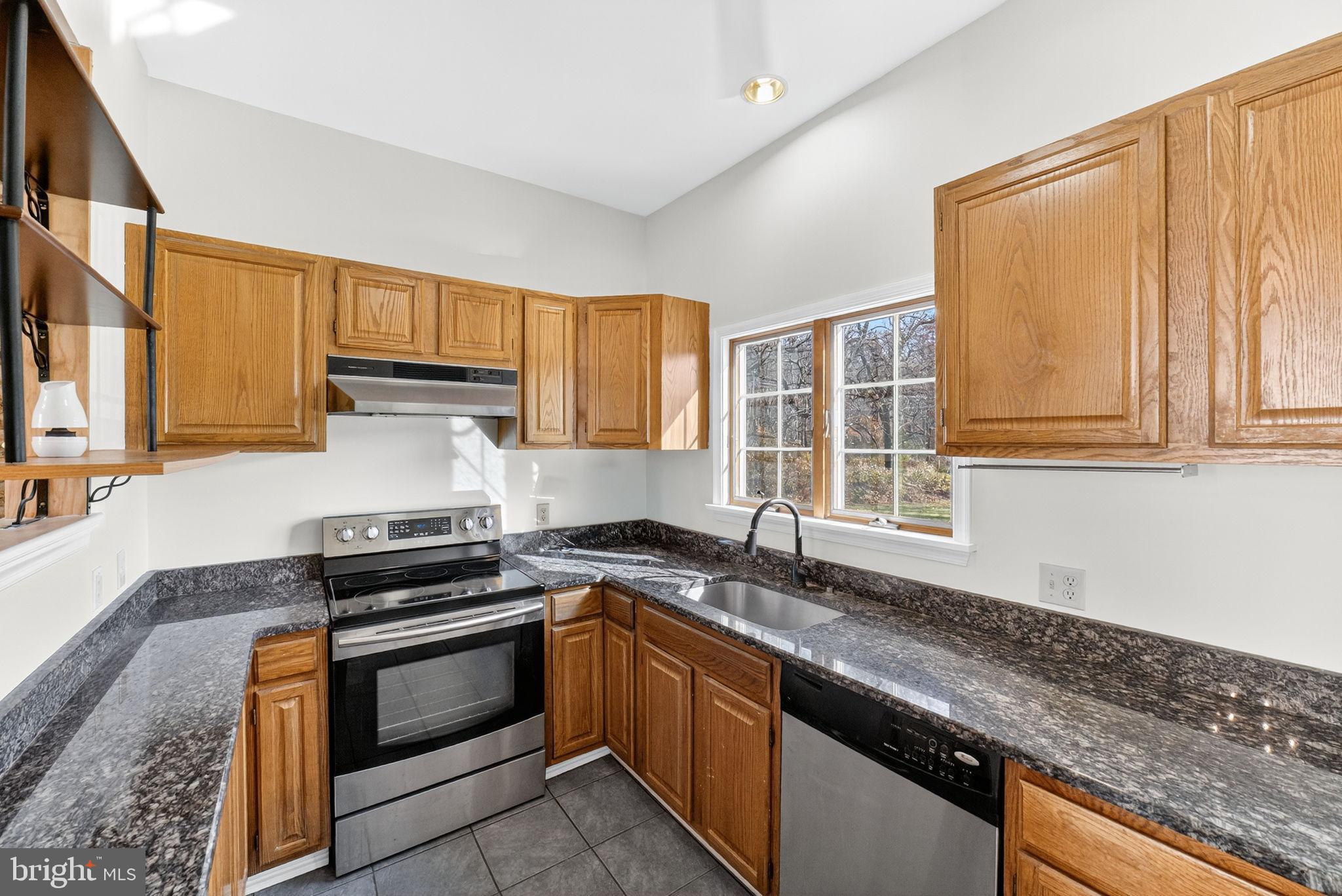 275 Sally Ann Furnace Road Mertztown, PA 19539 - Photo 7 of 33 Modern kitchen with warm wood accents.