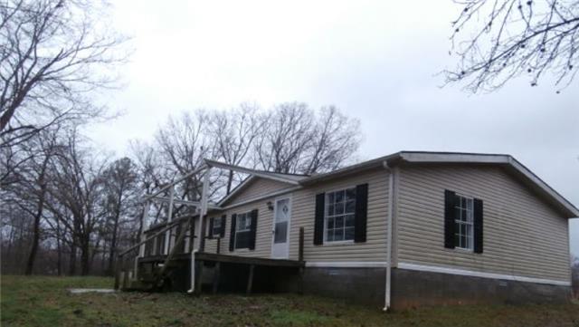 140 Sam Hollow Road Dickson, TN 37055 - Photo 1 of 11 a view of a house with a yard