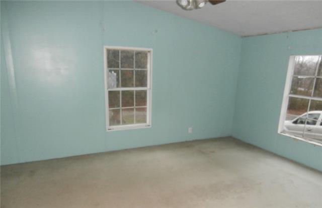 140 Sam Hollow Road Dickson, TN 37055 - Photo 8 of 11 an empty room with a window