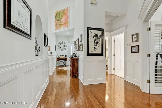 a living room with furniture fireplace and a flat screen tv