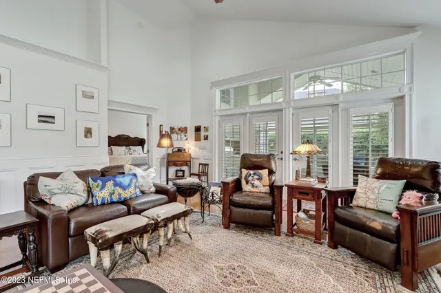 a bedroom with a bed and furniture