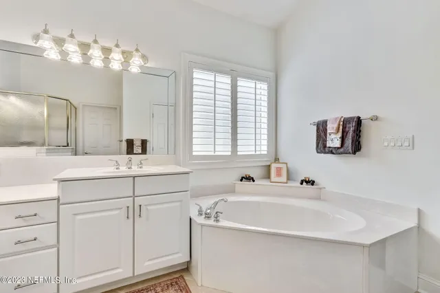 a outdoor living space with furniture and a floor to ceiling window