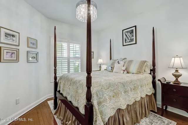 a living room with furniture windows and a fireplace