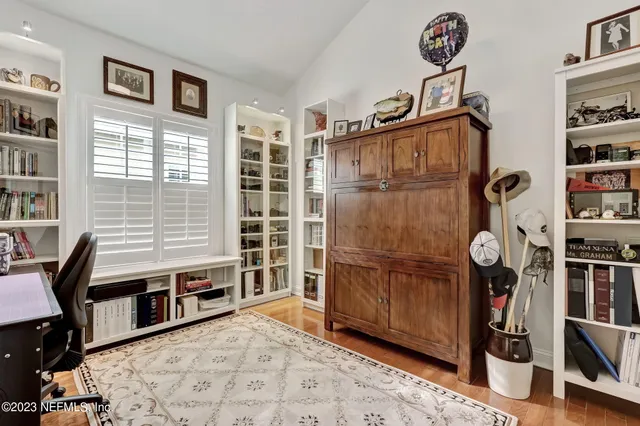 a dining room with furniture and window