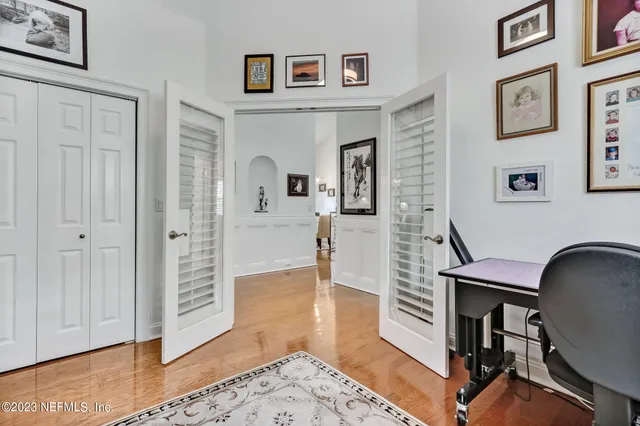 a front view of house with a garden