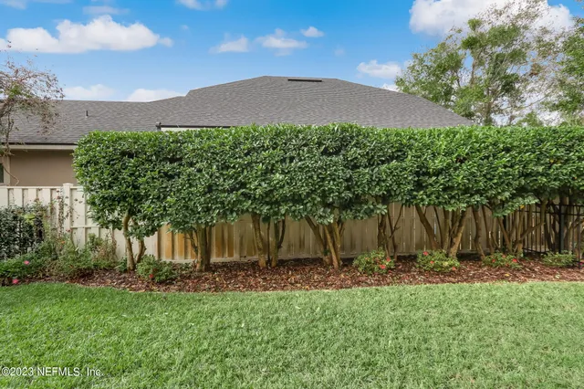 a view of a swimming pool with a lounge chairs