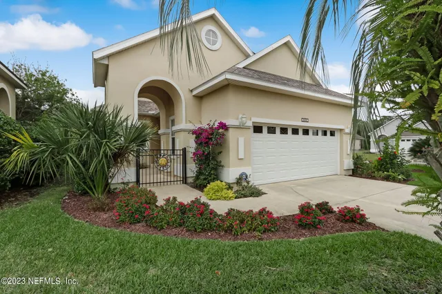 a kitchen with stainless steel appliances granite countertop a sink stove and microwave