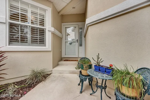 a kitchen with sink and cabinets