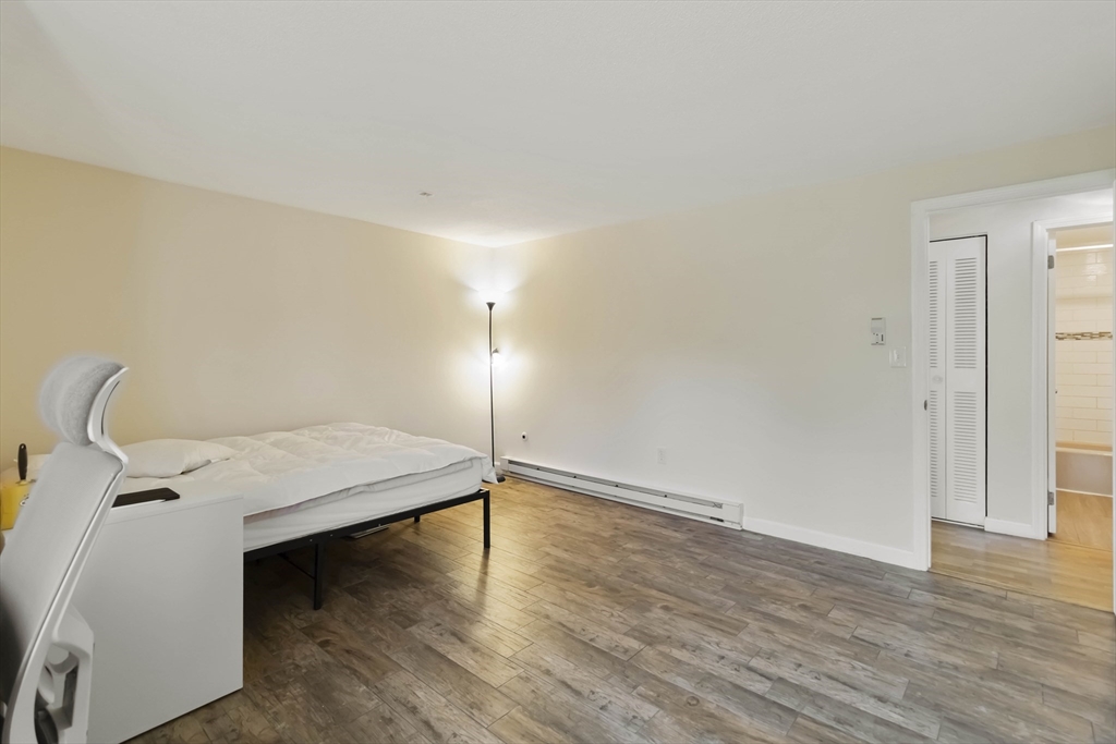 388 Great Road, Unit B14 Acton, MA 01720 - Photo 20 of 24 a workspace with wooden floor