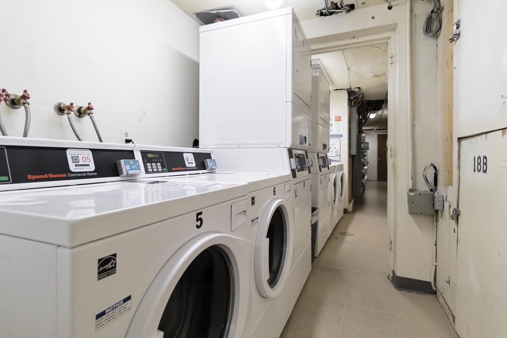 388 Great Road, Unit B14 Acton, MA 01720 - Photo 23 of 24 a utility room with dryer and washer