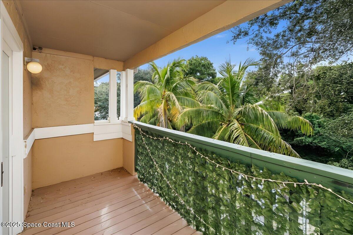 7667 North Wickham Road, Unit 118 Melbourne, FL 32940 - Photo 15 of 23 a view of balcony with a potted plant